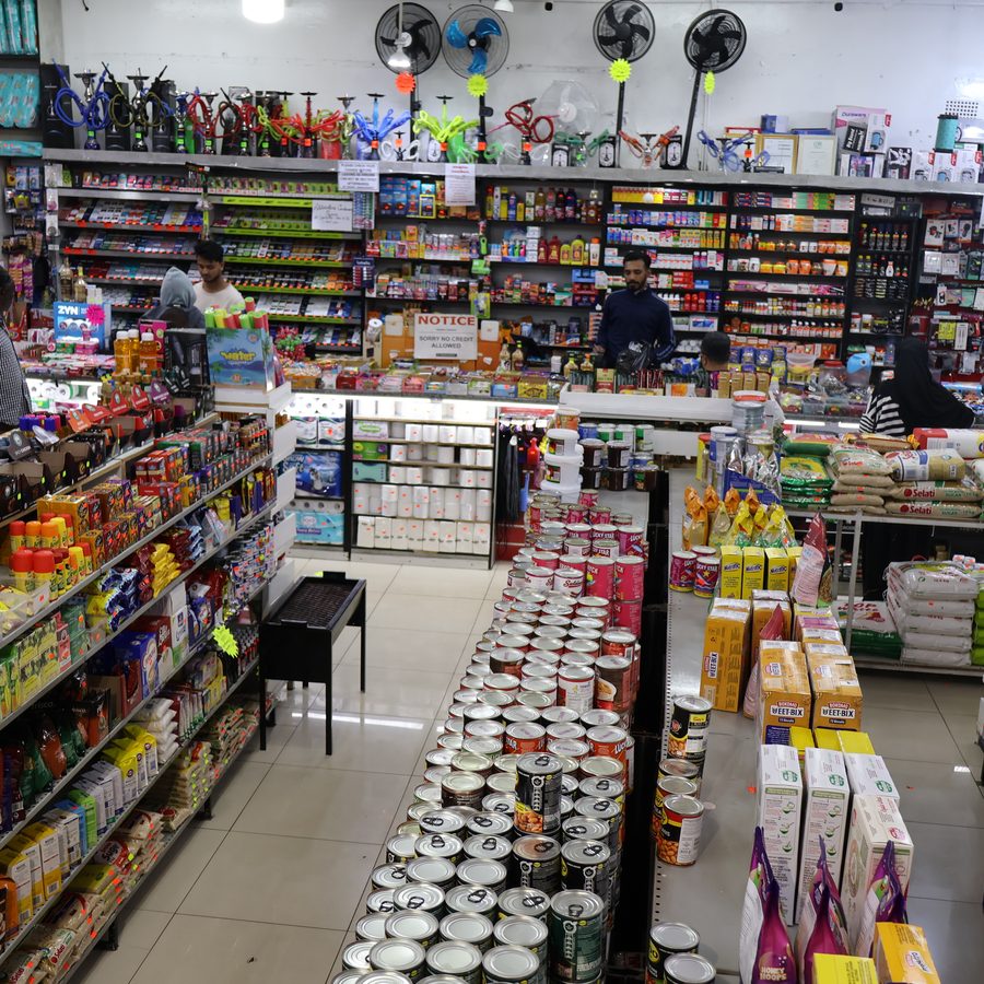 Canned goods, rice and sugar on the shelves